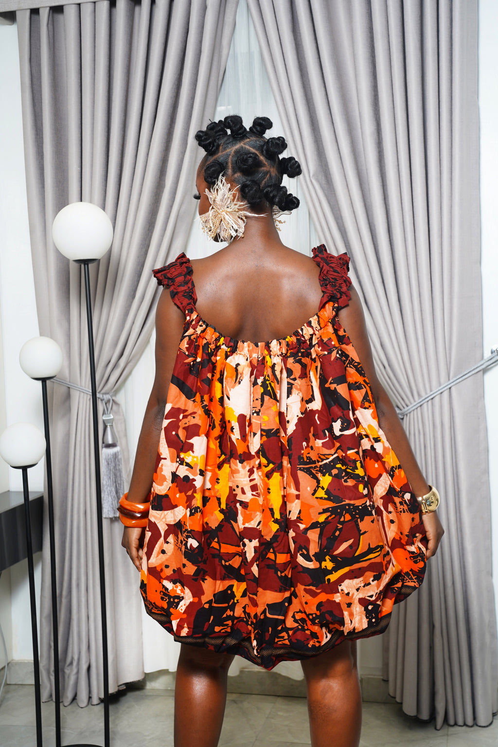 Woman wearing Boubou Ankara print dress by Selaro Luxury Wears Brown Back