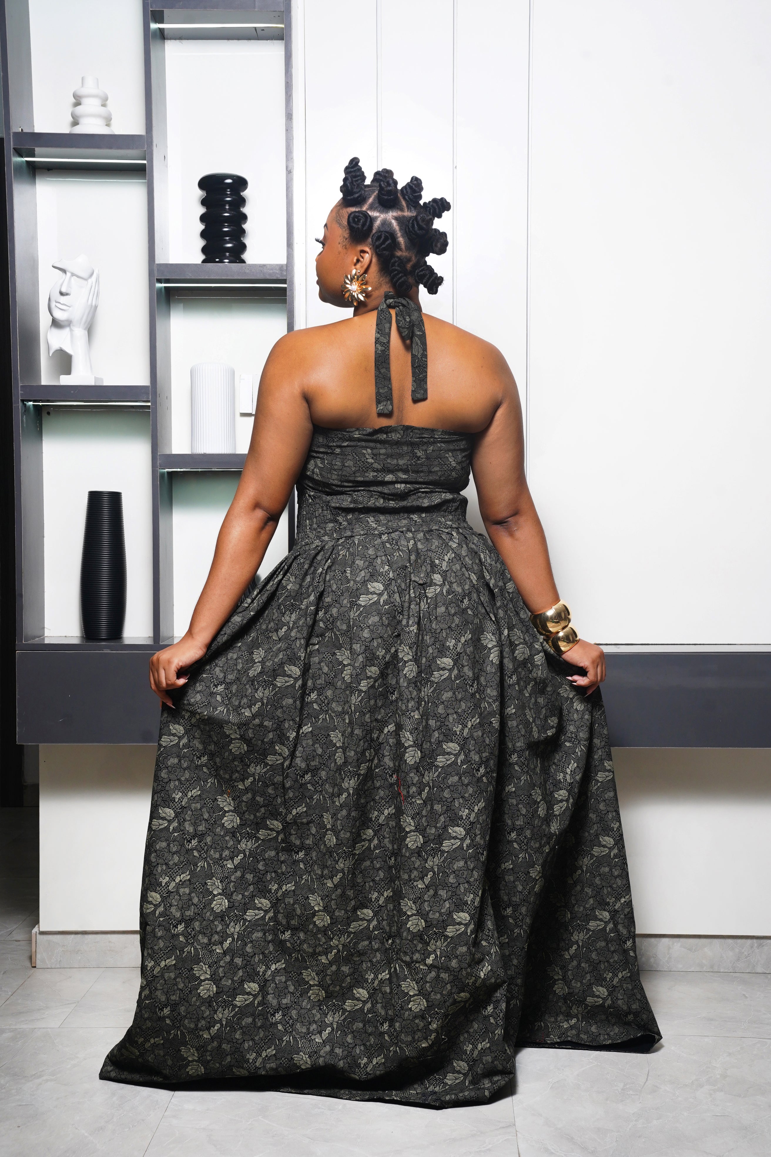 Woman wearing Black floral Ankara maxi dress by Selaro Luxury Wears